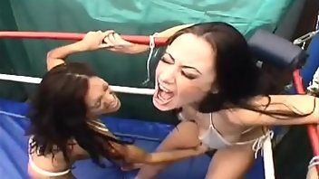 Two girls wrestling